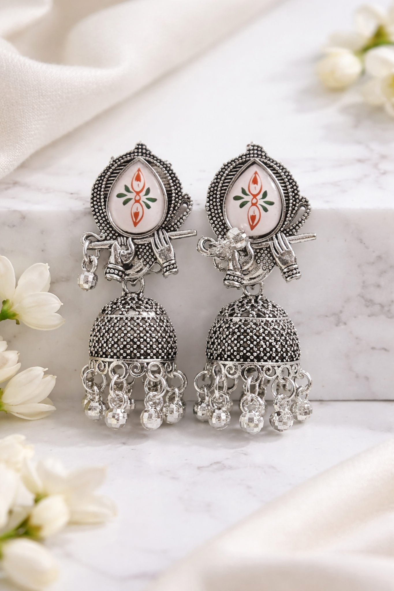 Sacred Tilak & Krishna Flute Oxidised Silver Jhumka Earrings